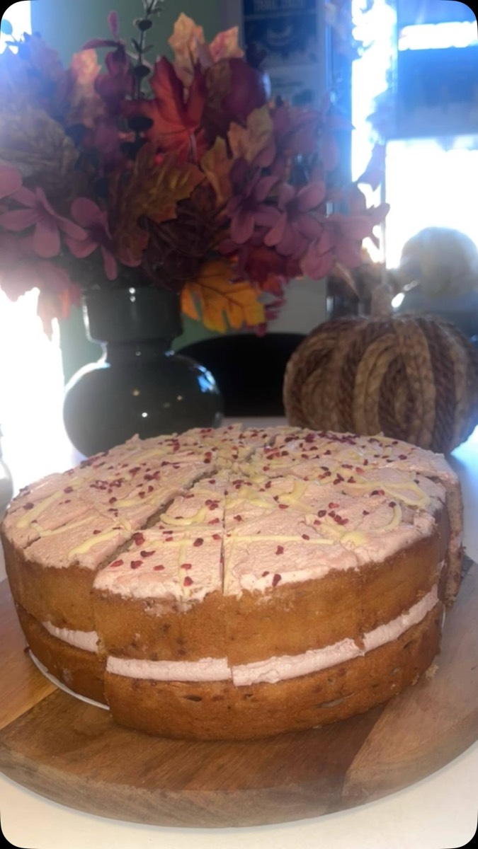 A layered sponge cake on the counter